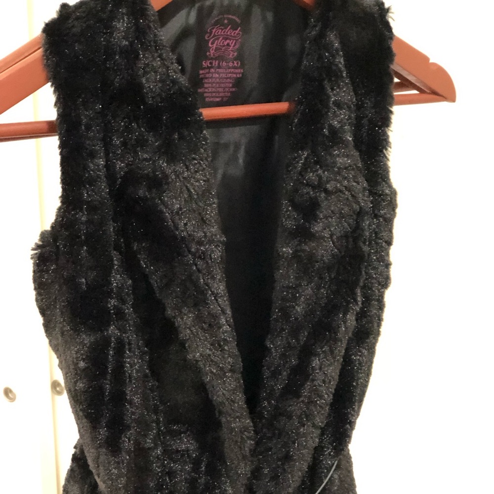 Faux Jacket with belt .